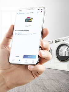 Bosch washer and dryer paired with the Home Connect app.