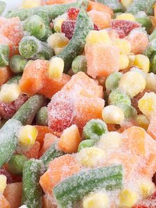 Colourful frozen vegetables in a bowl. 