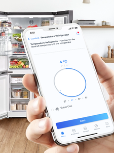 Phone open to the Home Connect app. A fridge in the background.