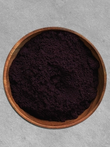 A bowl of açai berry powder.