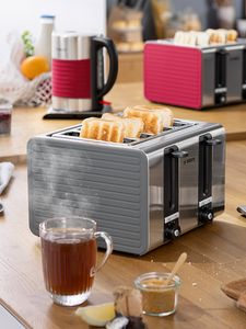 Silicone 4-slice toaster in grey, surrounded by hot drinks on the kitchen top.