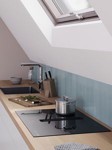A venting hob can be installed next to a slanted wall as there is no need for a hood.