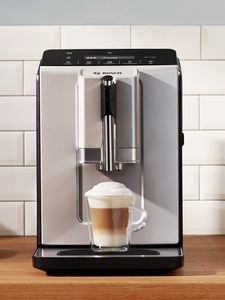 Series 2 VeroCafe coffee machine with cappuccino on kitchen counter.