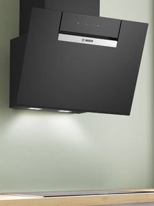 Modern kitchen hood with sleek design, perfect for maintaining a smoke-free cooking environment. 