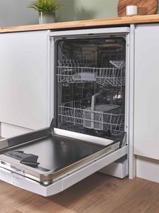 Freestanding dishwasher under kitchen counter with open door