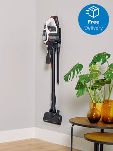 Unlimited vacuum cleaner hanging on wall with free delivery icon in top right corner