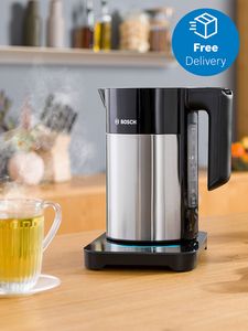 Kettle and hot mug of herbal tea on countertop with free delivery icon in top right corner