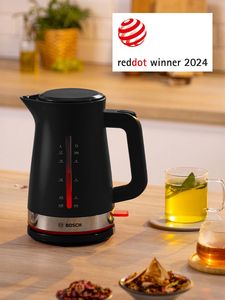 Black Bosch kettle with different tea drinks next to it, with Reddot Winner 2024 icon