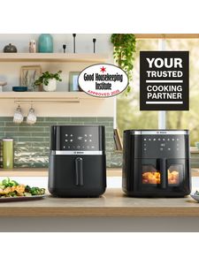 Air fryer models on kitchen counter with Good Housekeeping badge