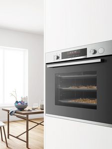Oven with chocolate chip cookies being baked