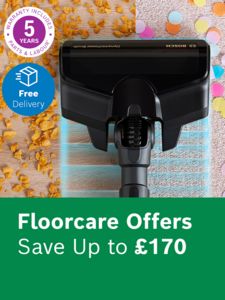 Bosch vacuum cleaner in use cleaning cornflakes and 5 year warranty logo