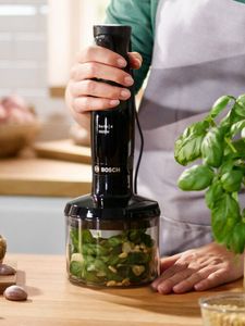 Bosch blender being used for basil, garlic and pine nuts