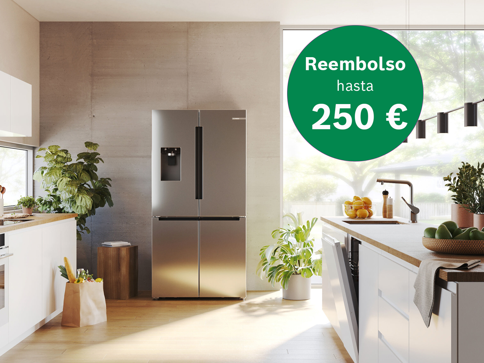 Cocina luminosa con frigor&iacute;fico Bosch, lavavajillas en la isla, plantas y etiqueta "Reembolso hasta 250 &euro;".