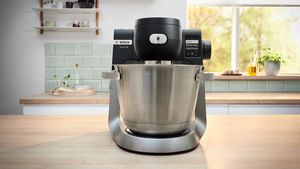 A front shot of a black/silver Series 6 stand mixer.
