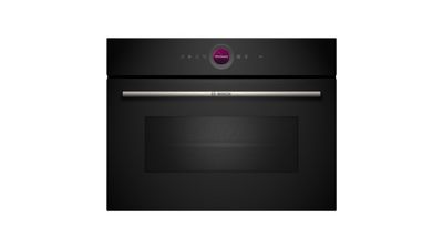 Acero inoxidable horno de microondas Bosch con pantalla digital y panel de control.
