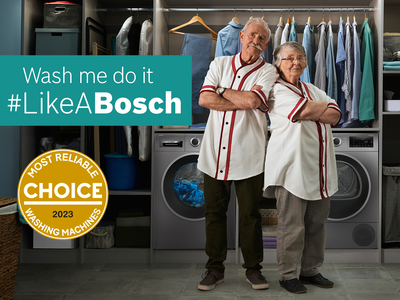 Bosch built-under washer in a modern white laundry room.