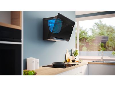 Built in cooker hoods in a white kitchen.