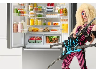 Bosch Refrigerator open with guy in front playing guitars