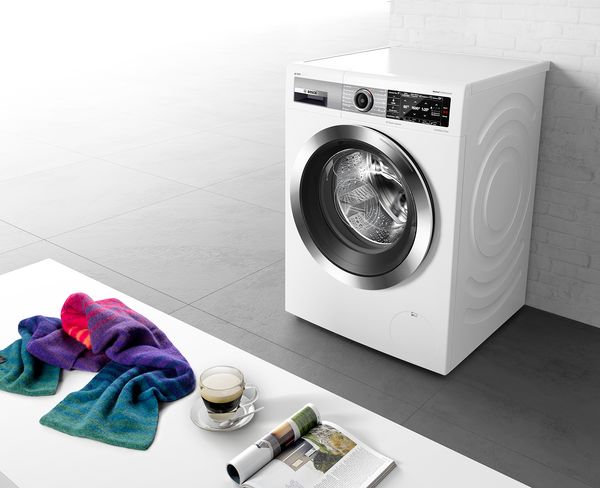 Waschmaschinen mit Fleckenautomatik entfernen Flecken aus Kleidung und Textilien.