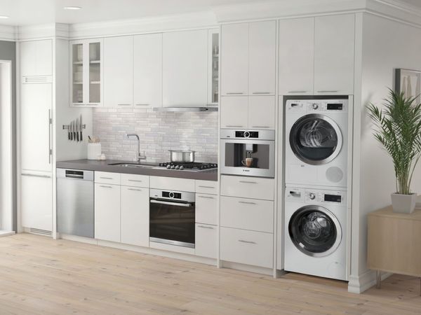 Small kitchen with built-in stove and built-in coffee machine