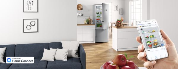 L'appli Home Connect montre le contenu d'un réfrigérateur Bosch en arrière-plan.  