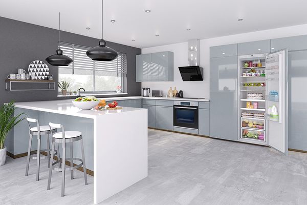 Modern open kitchen with island and Bosch appliances.