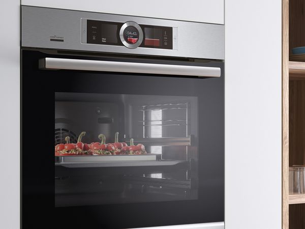 Bosch oven showing food cooking inside