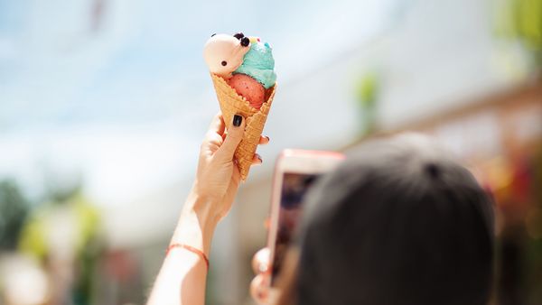 Photo being taken of an ice cream cone 