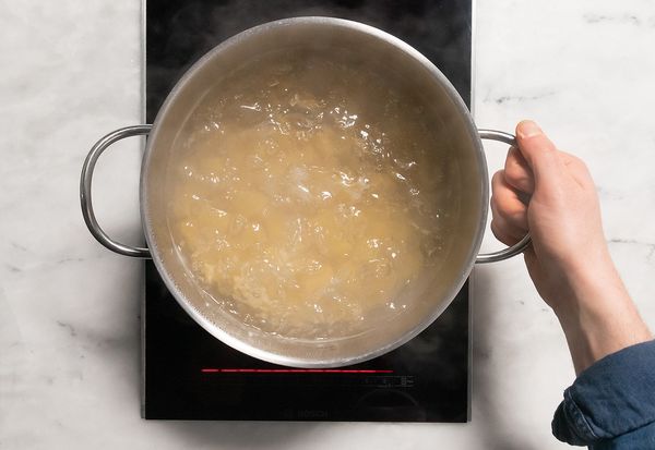 Ingredients in a pan on Bosch electric cooktop