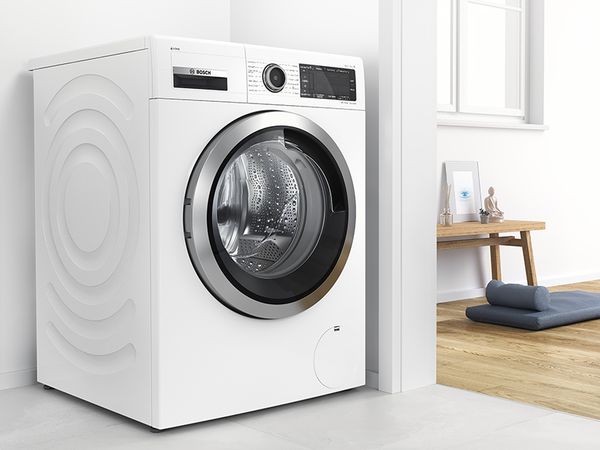 Bosch washer with EcoSilence Drive motor, relaxation space in background