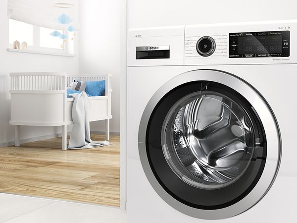 Bosch tvättmaskin med EcoSilence Drive-motor, barnkammare i bakgrunden