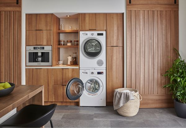 Laundry pair stacked with washer door open