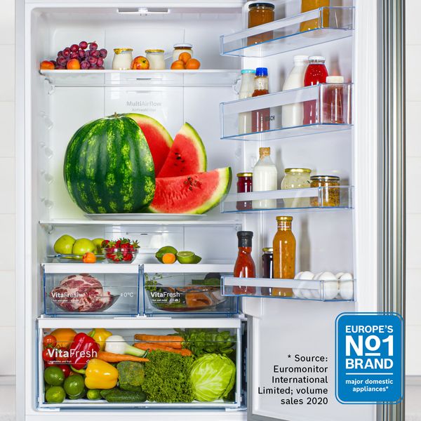 Open fridge showing inside contents with Europe's No1 logo in corner