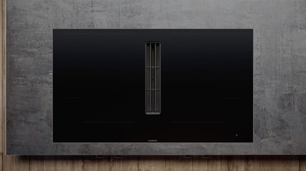 Gaggenau 400 series flex induction cooktop with downdraft ventilation