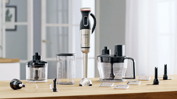 MaxoMixx hand blender set with the maximum number of attachments on a kitchen worktop.