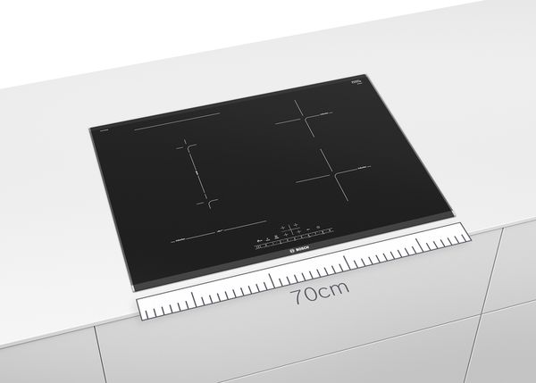 A Bosch 78cm electric hob in black with a blue ruler below illustrating the size.