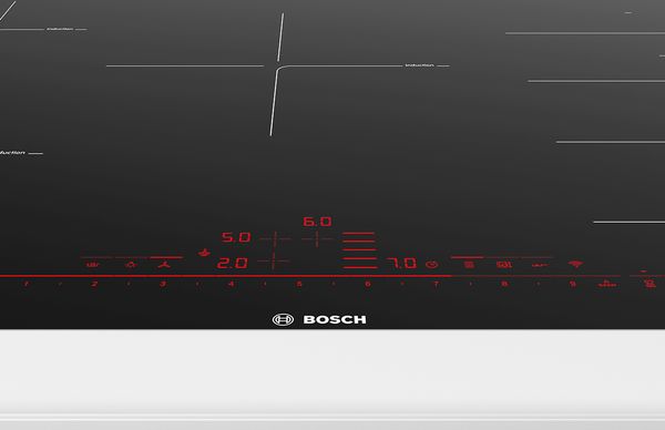A Bosch electric hob featuring a premium touch control display.