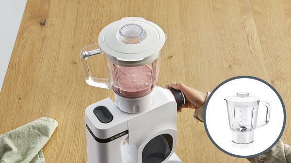 Um smoothie cor-de-rosa a ganhar vida num jarro de vidro para Robô de cozinha Serie 2.
