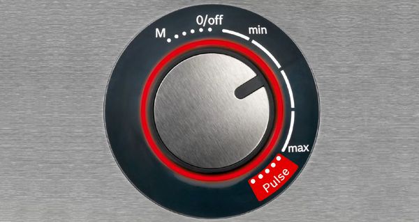 Closeup of the food processor control dial, showing the different speeds.