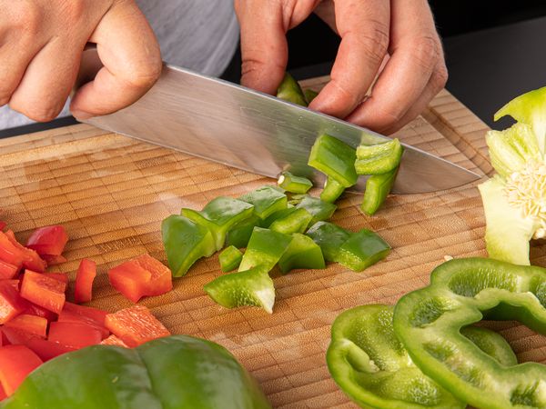 Dicing vegetables on a cutting board
