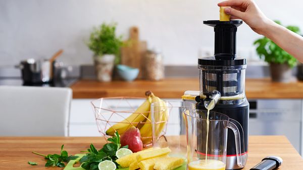 Making fresh juice out of various fresh fruits with the VitaExtract slow juicer.