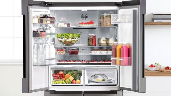 Large, wide-opening grey two-door fridge with Freezer