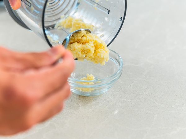 take out garlic paste in a bowl