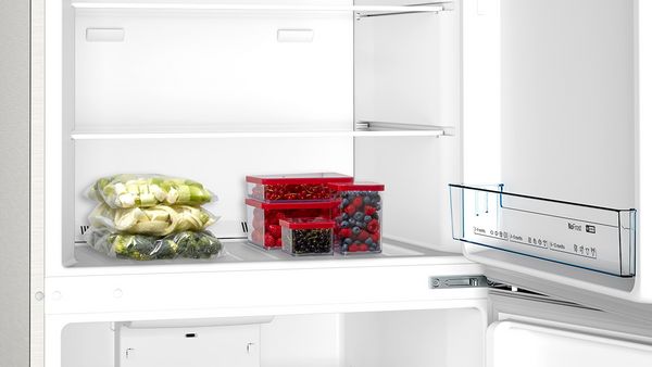 Freestanding fridge-freezers with freezer at top