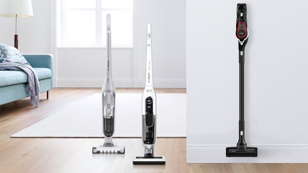 Upright and stick cordless products lined up in the living room.