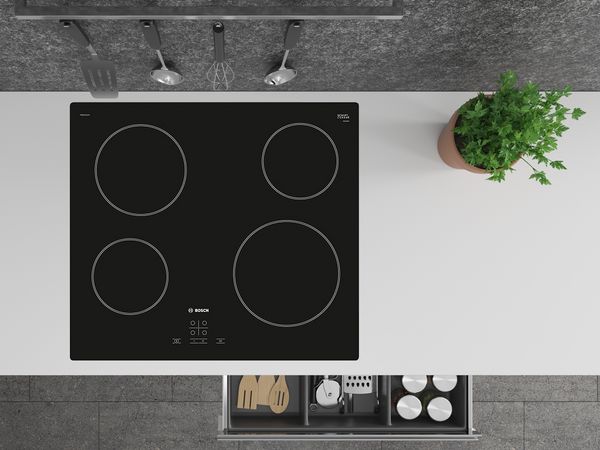 An electric hob with one pot.