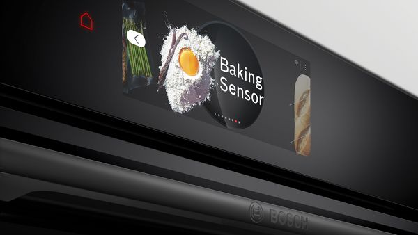 Black Bosch smart oven, built-in, with advanced features for modern kitchens.