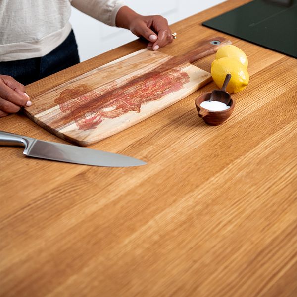 Lemons salt and knife with cutting board