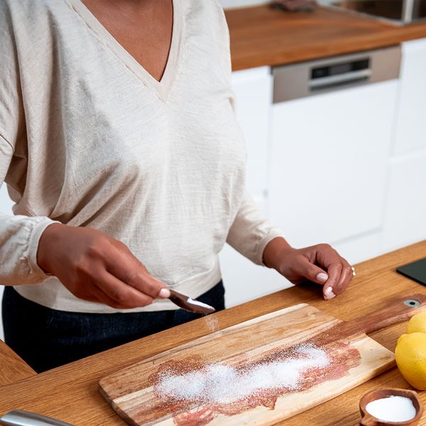 Pouring salt on the cutting board