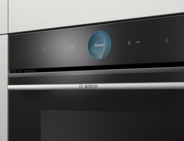 The digital control ring of a Series 8 oven displaying the steam functionality.